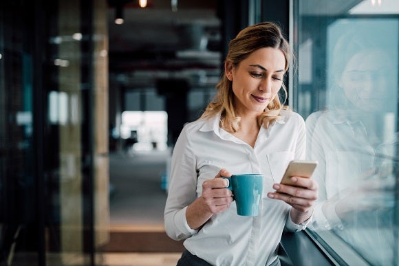 woman on phone in office woman on phone in office