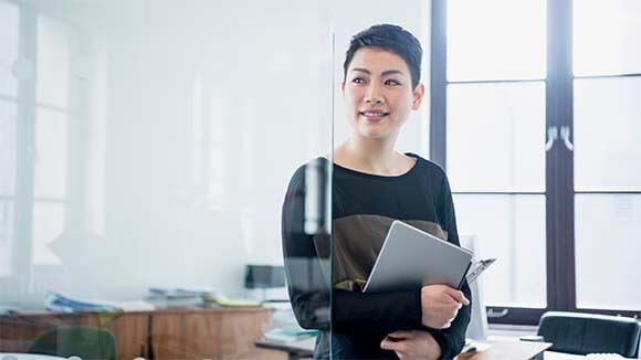 Woman in glass meeting room Woman in glass meeting room