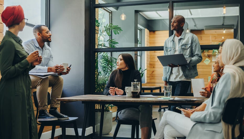 group of people in informal meeting room